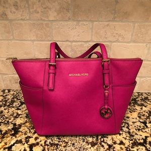 Michael Kors hot pink handbag           $60